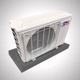 White air conditioning unit on C&H Sophia Series condenser pad with shock-absorbing base