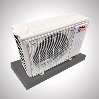 White air conditioning unit on C&H Sophia Series condenser pad with shock-absorbing base
