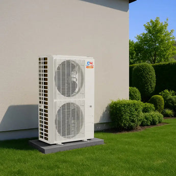 Two-fan air conditioning unit on C&H Sophia Series condenser pad with shock-absorbing base