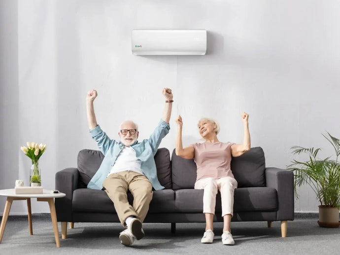 White wall-mounted air conditioner with sleek design and modern aesthetic.
