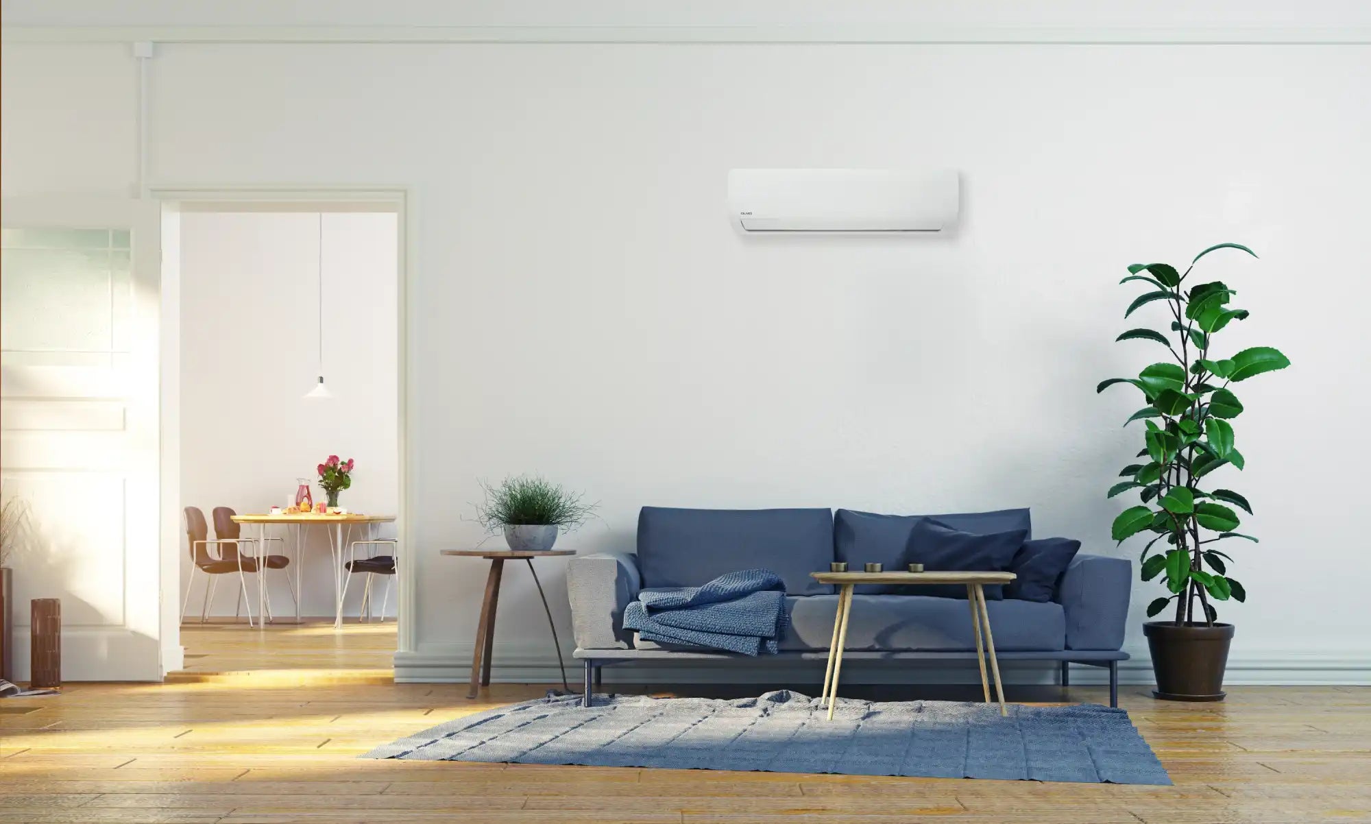 White wall-mounted air conditioner with sleek design and modern aesthetic.
