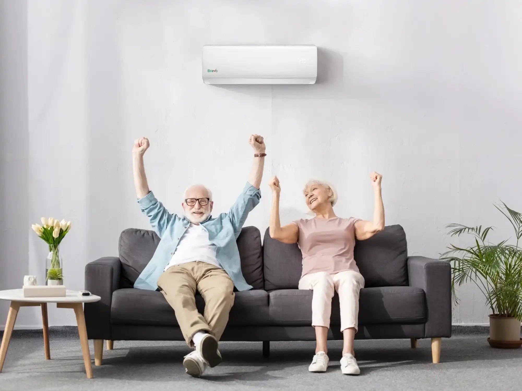 White wall-mounted air conditioner with sleek design and modern aesthetic.
